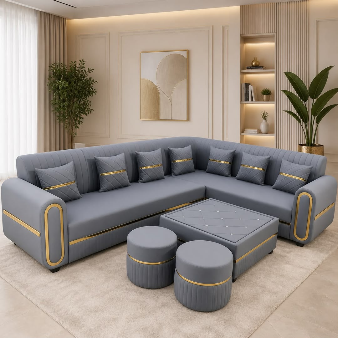 Gray custom sectional sofa with coordinated gold detailing