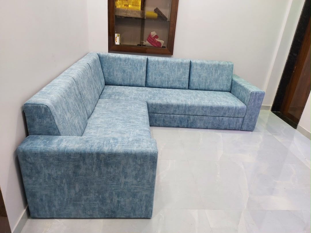 Compact light blue L-shaped sofa