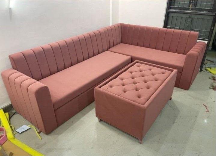 Rose upholstered corner sofa with tufted ottoman
